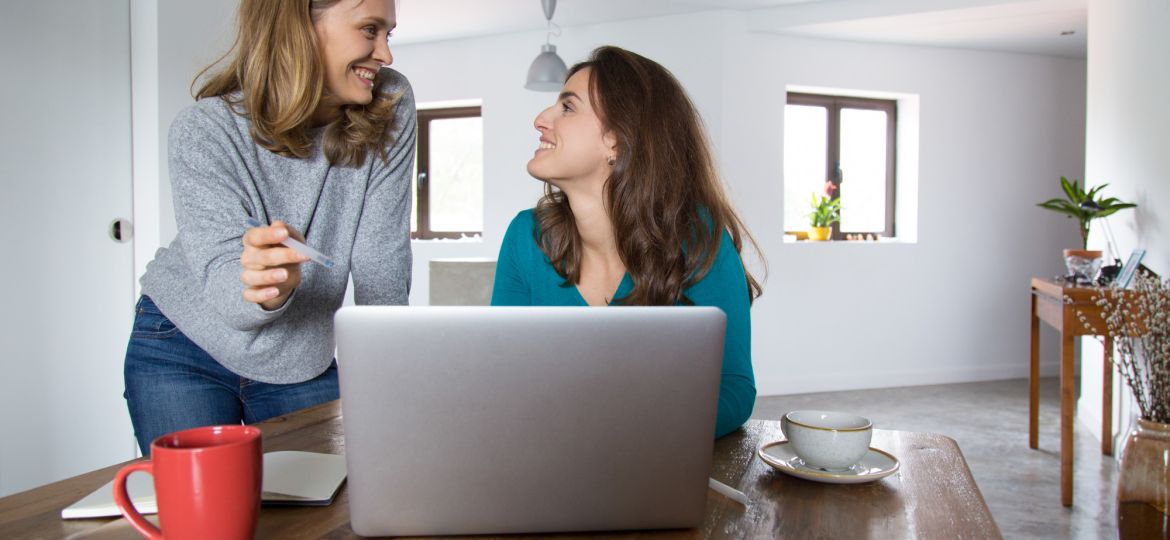 cheerful-female-friends-watching-discussing-media-content (Demo) (Demo)